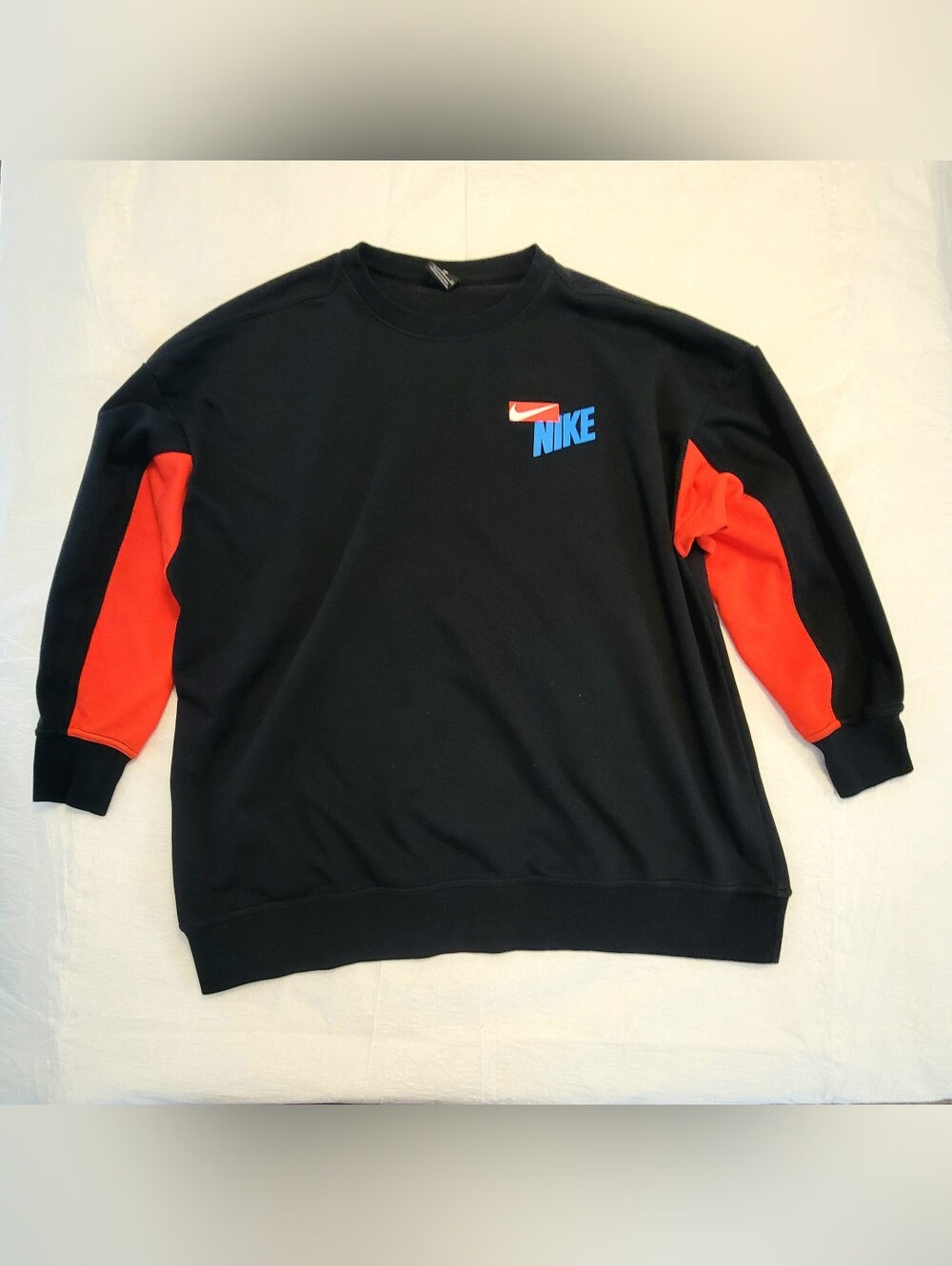 Nike Black Crewneck Sweater with Red Sleeves and Blue Logo